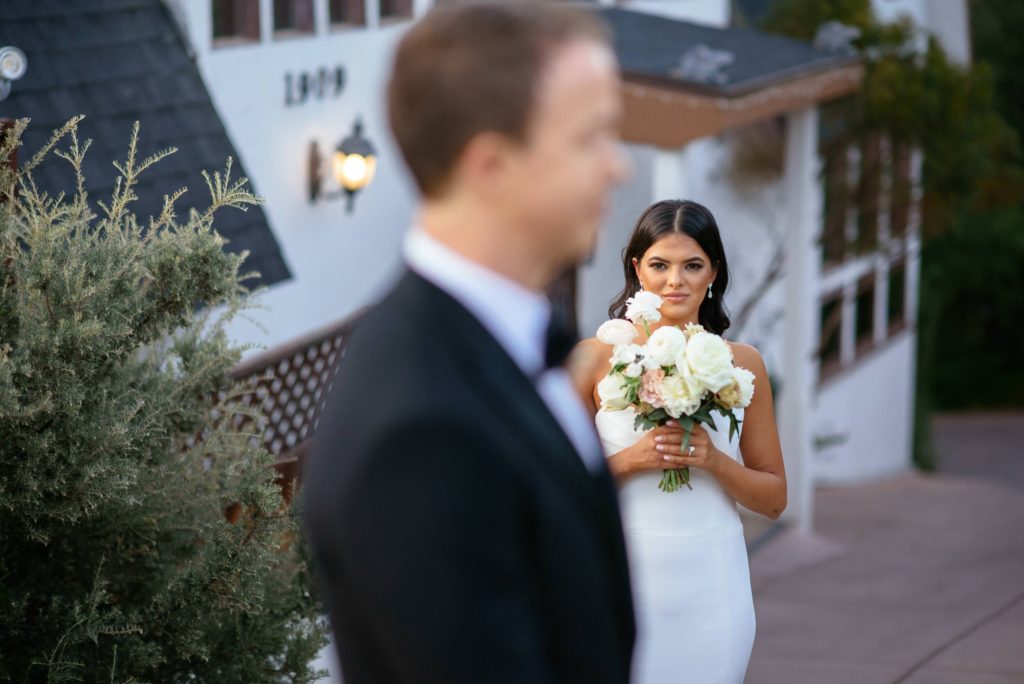 A sophisticated wedding at the 1909, bride and groom first look 
