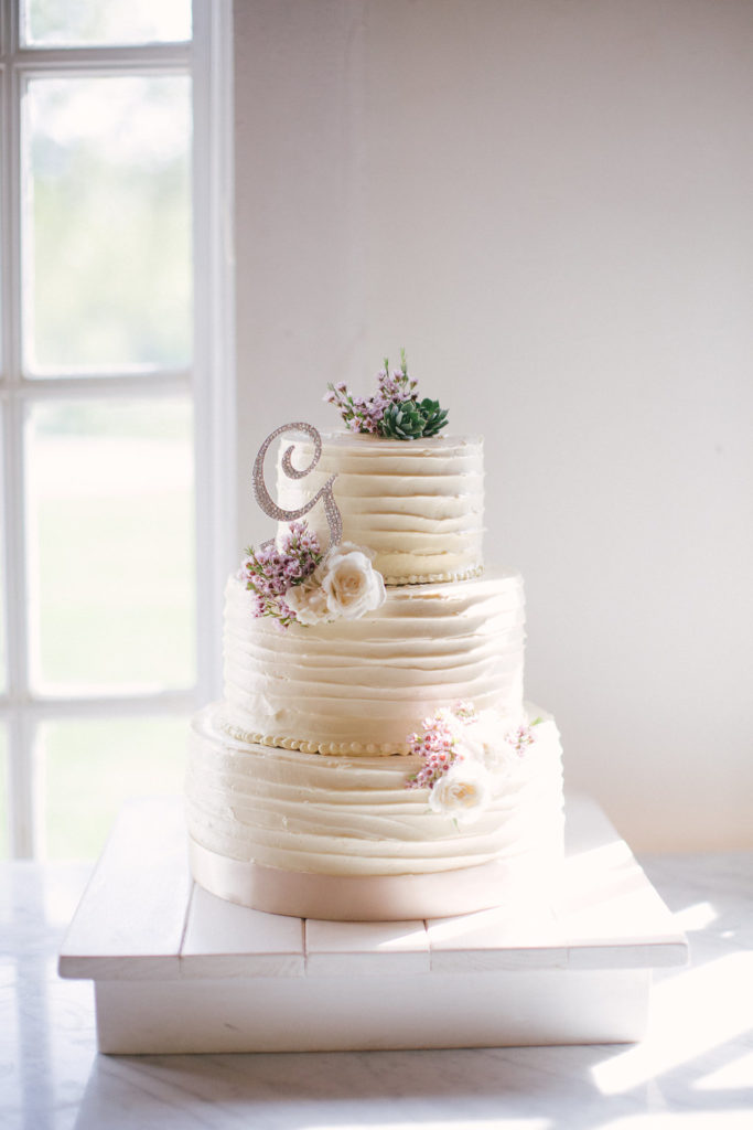 three tier wedding cake with succulents 
