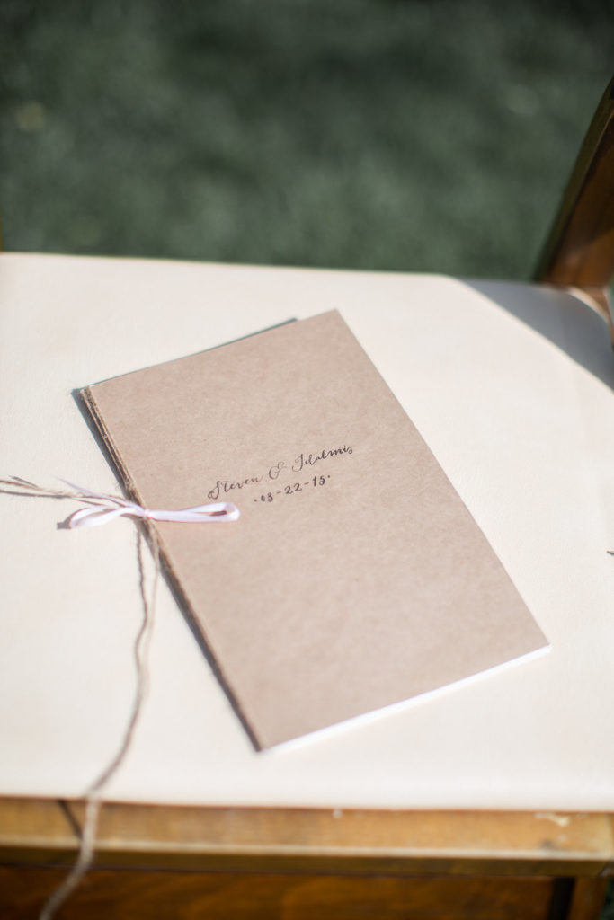 Craft paper wedding program for A sweet, small wedding ceremony at Triunfo Creek Vineyards