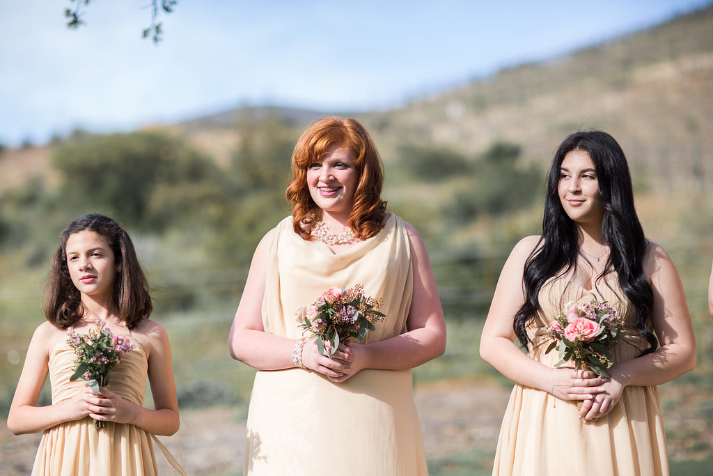 bridesmaids in pale yellow bridesmaid dresses
