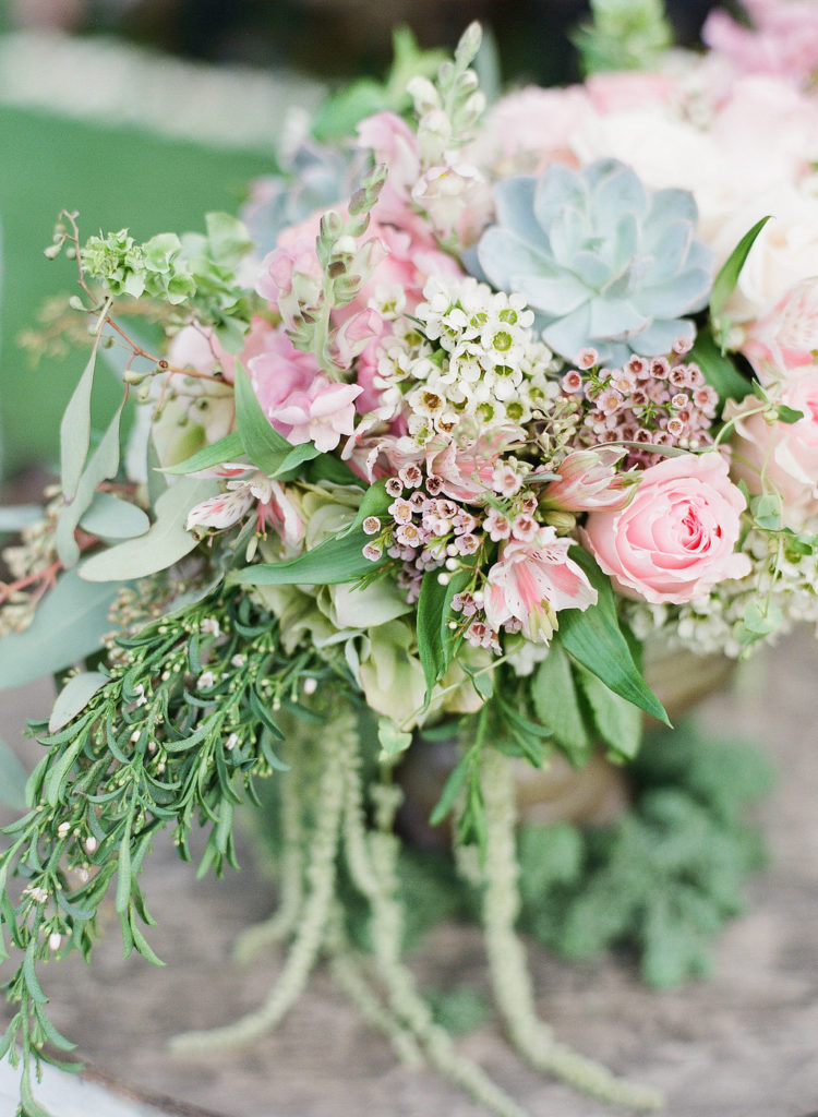 pink florals and greenery with succulents