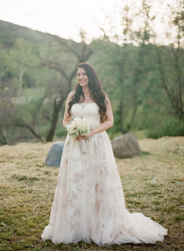 bridal portrait shot with strapless wedding dress and brocade details
