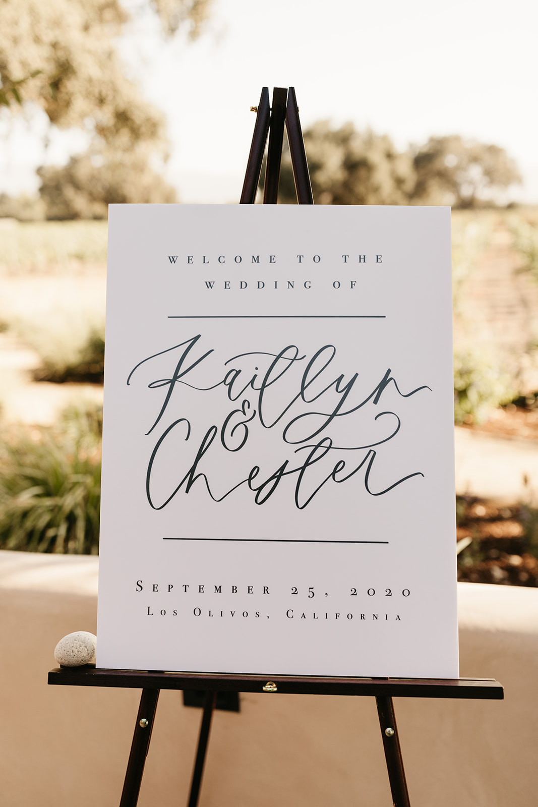 Simple wedding welcome sign for this intimate vineyard wedding