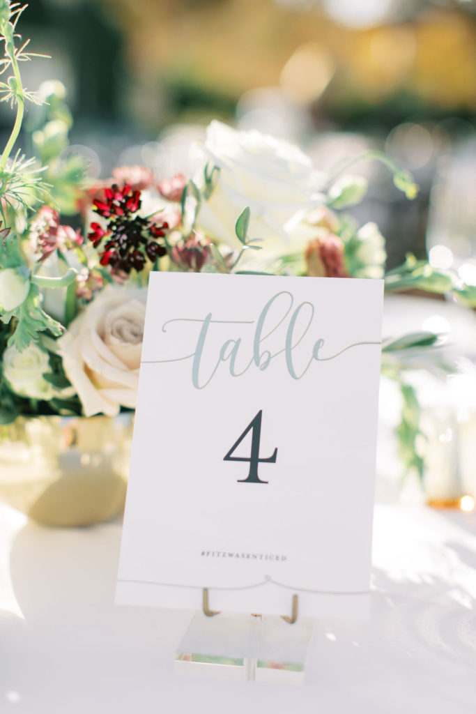 Autumn wedding reception outdoors at Triunfo Creek Vineyards table number
