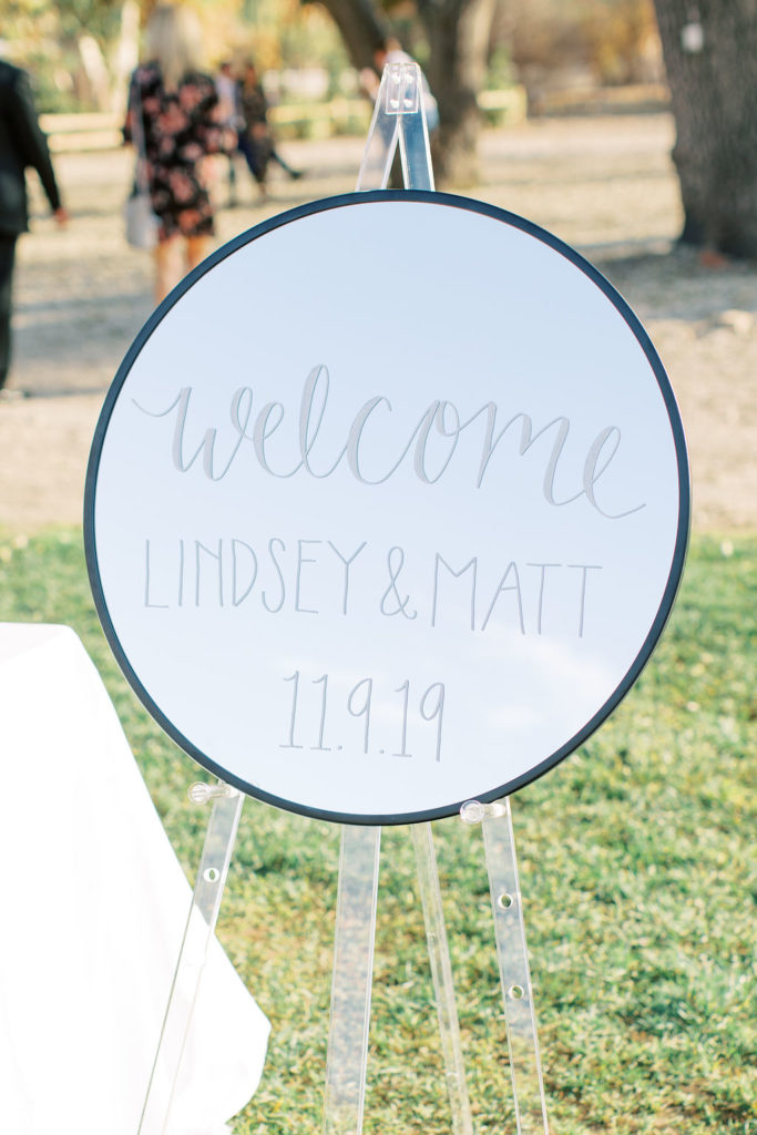 minimalist wedding welcome sign with acrylic stand