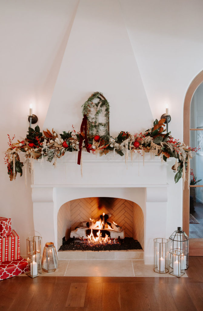 cozy non-traditional holiday home decorations onto of fireplace mantle