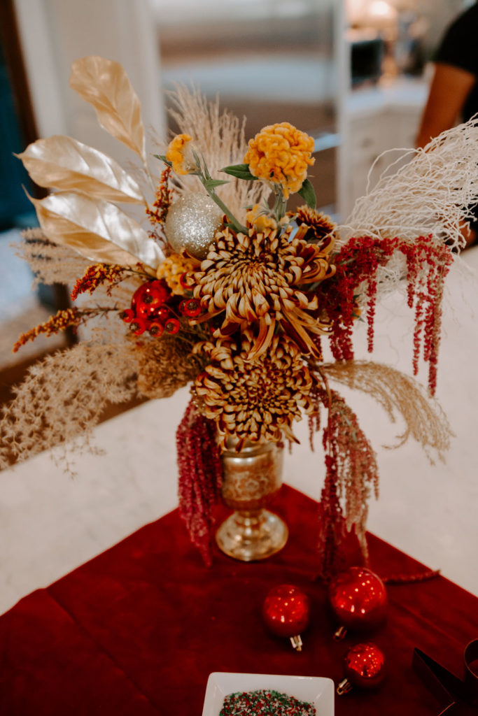 holiday flower arrangement with dried flowers