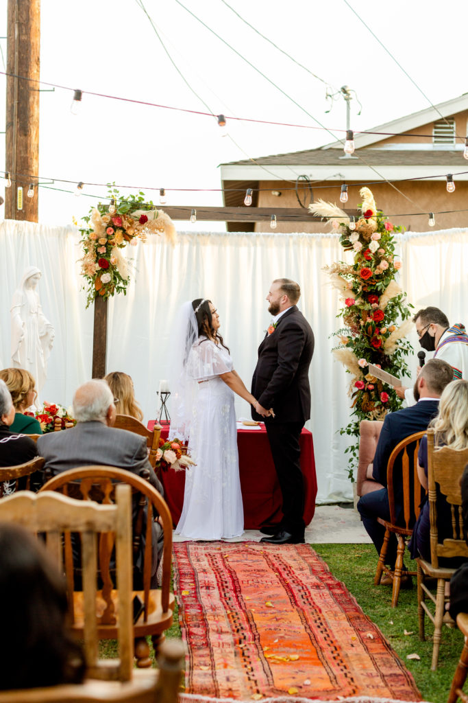 Christian backyard wedding ceremony during Covid
