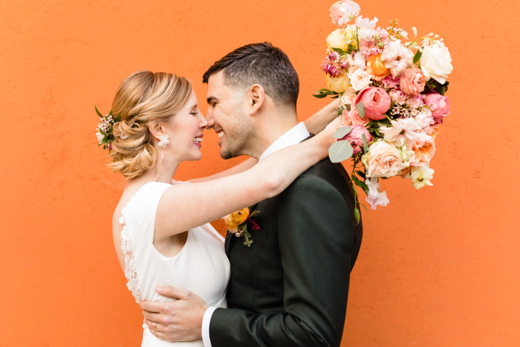 colorful bride and groom portrait shots for their spring wedding at Hotel Figueroa in downtown Los Angeles