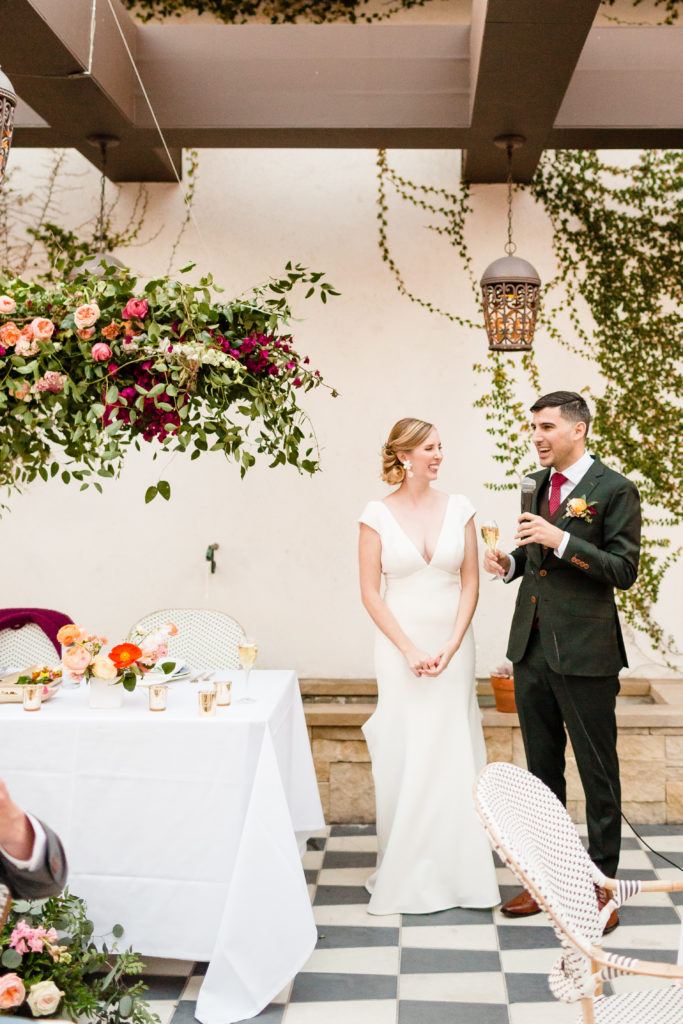bride and groom give toast at spring wedding at Hotel Figueroa