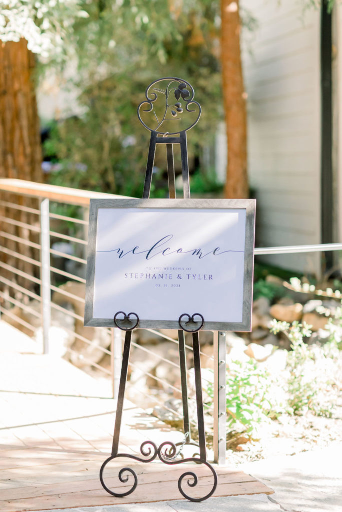 wooden framed wedding welcome sign
