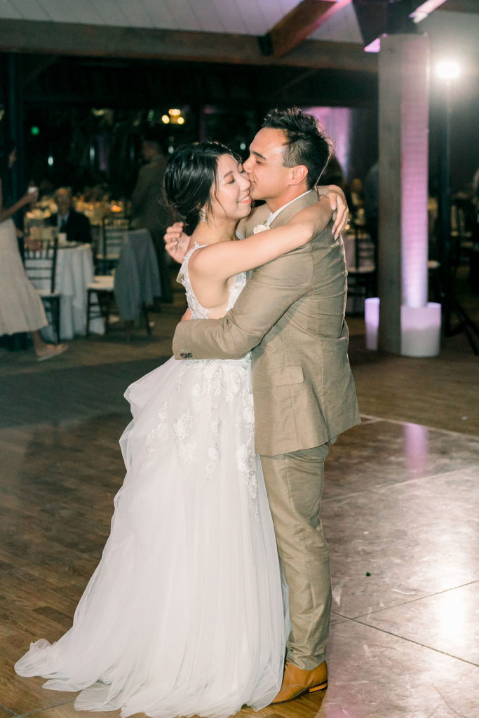 bride and groom share first dance at the Redwood Room at Calamigos Ranch