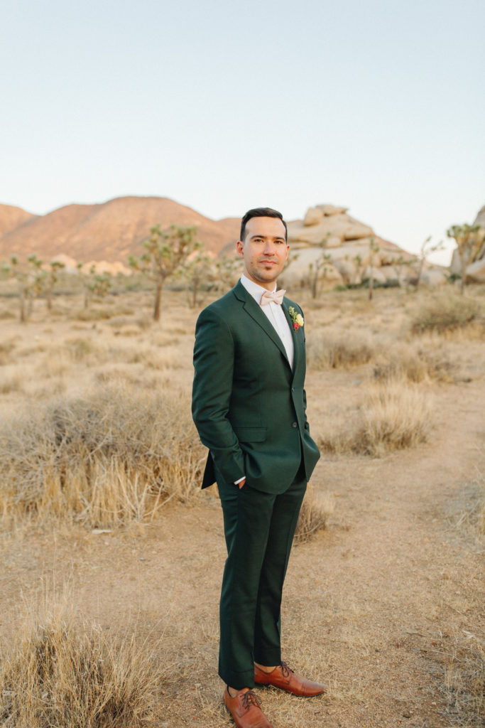 groom portrait in desert
