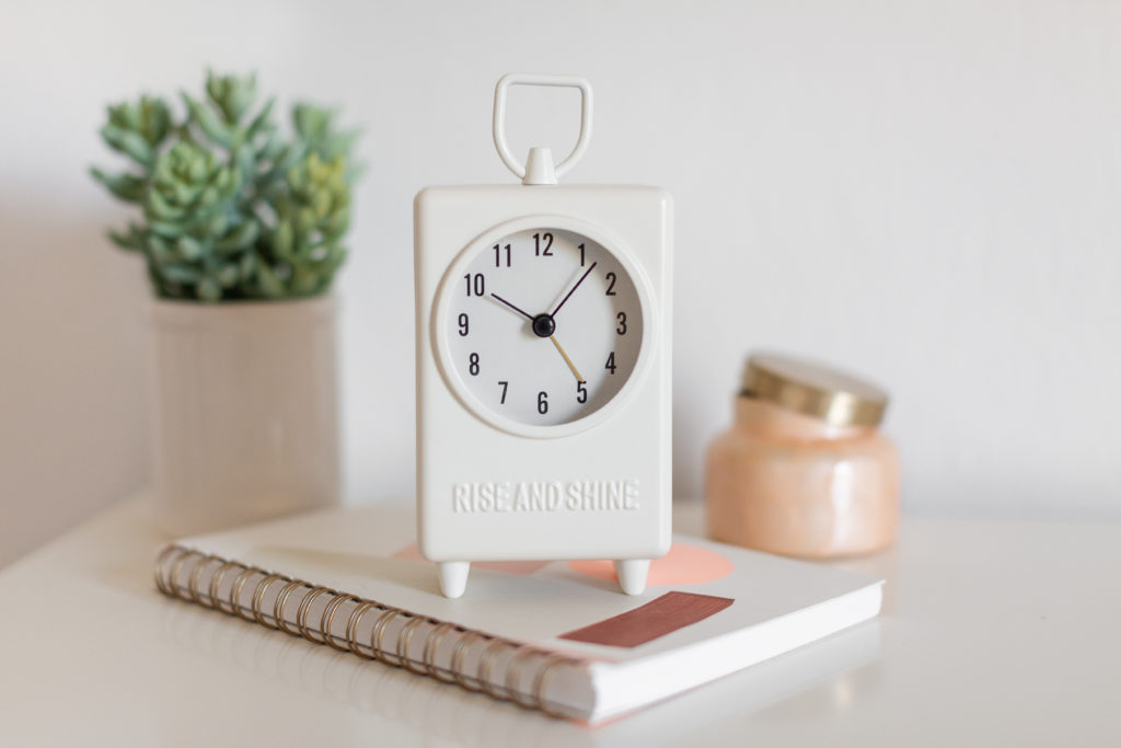 setting an alarm clock will help your prioritize your self-care routine