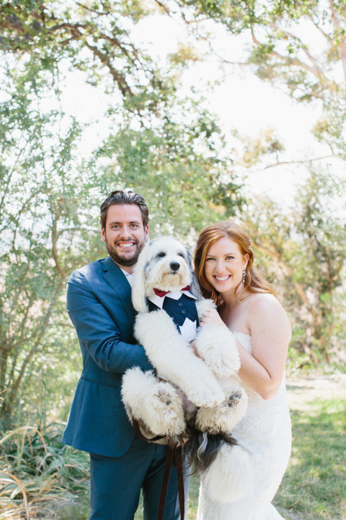 bride and groom portrait shot with their dog before their autumn wedding in the Santa Monica Mountains