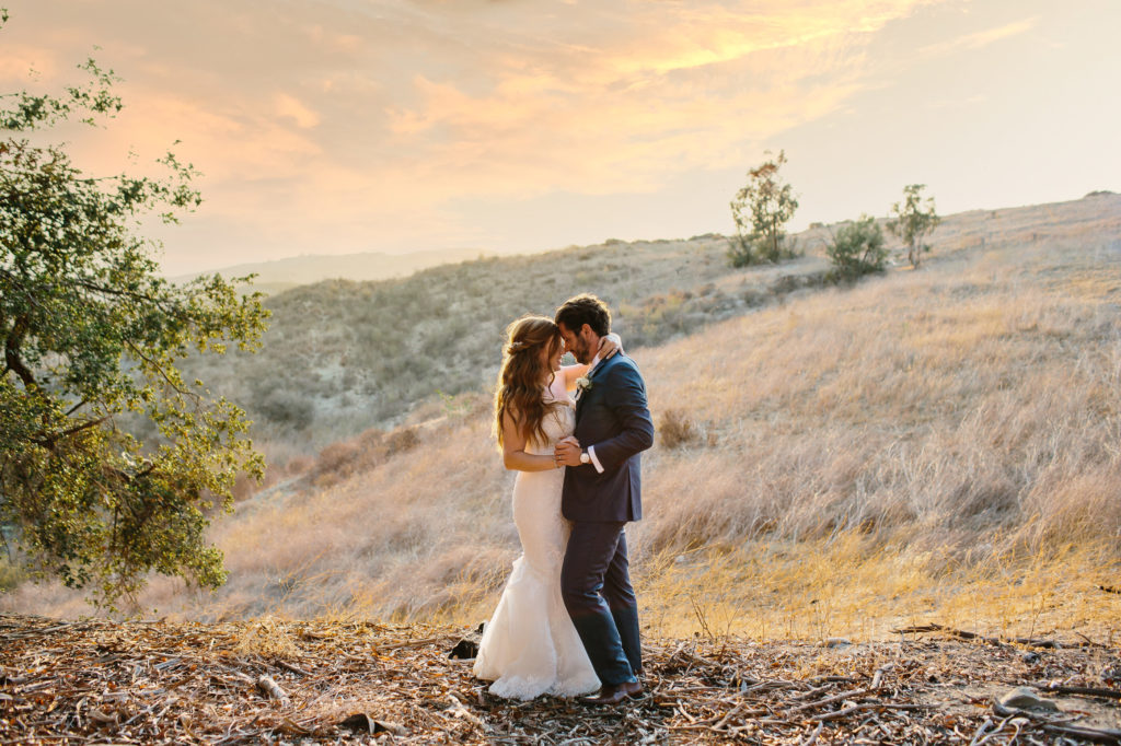 bride and groom wedding portraits at sunset in the Santa Monica Mountains