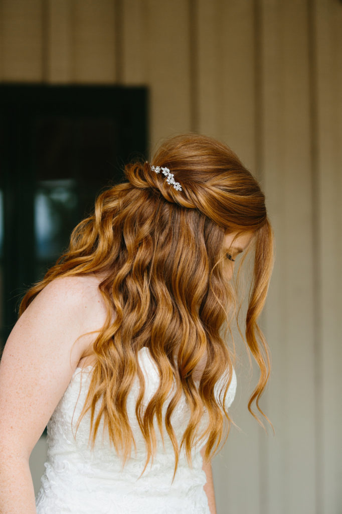 long bridal hair style with curls and half-do and crystal details