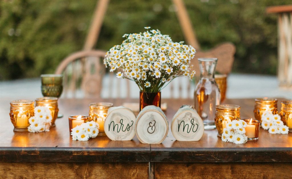 wooden mr and mrs sign at sweetheart table