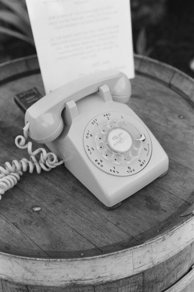 retro phone for guests to leave messages during cocktail hour