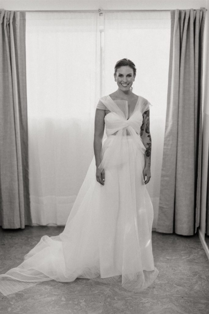 bride in modern asymmetrical wedding dress 