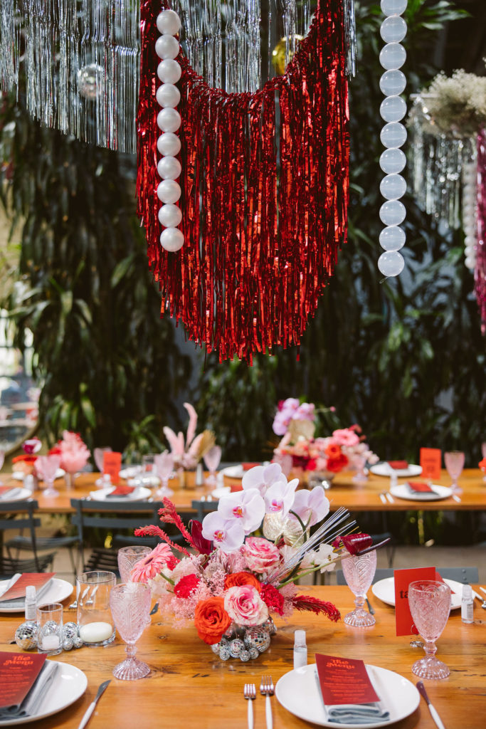 disco inspired wedding reception at Millwick in DTLA with hanging tinsel installations