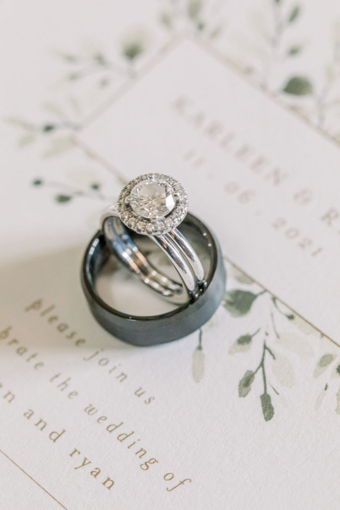 ring detail shot with round diamond halo engagement ring