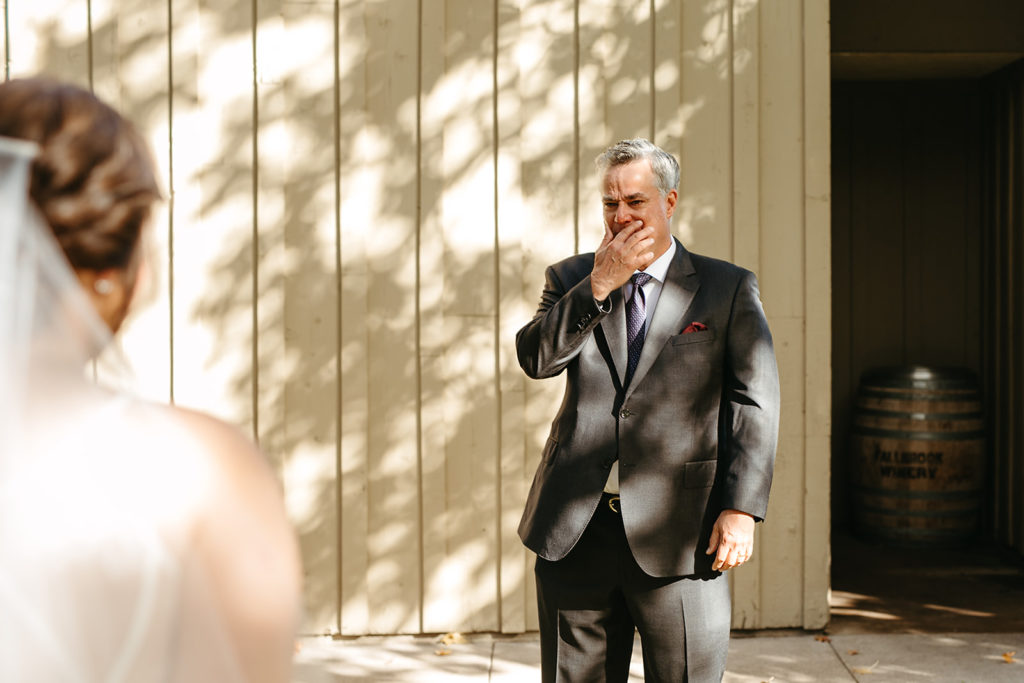 emotional father of the bride during first look