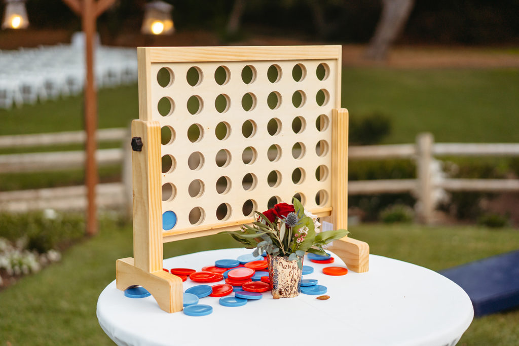 connect four lawn game during cocktail hour