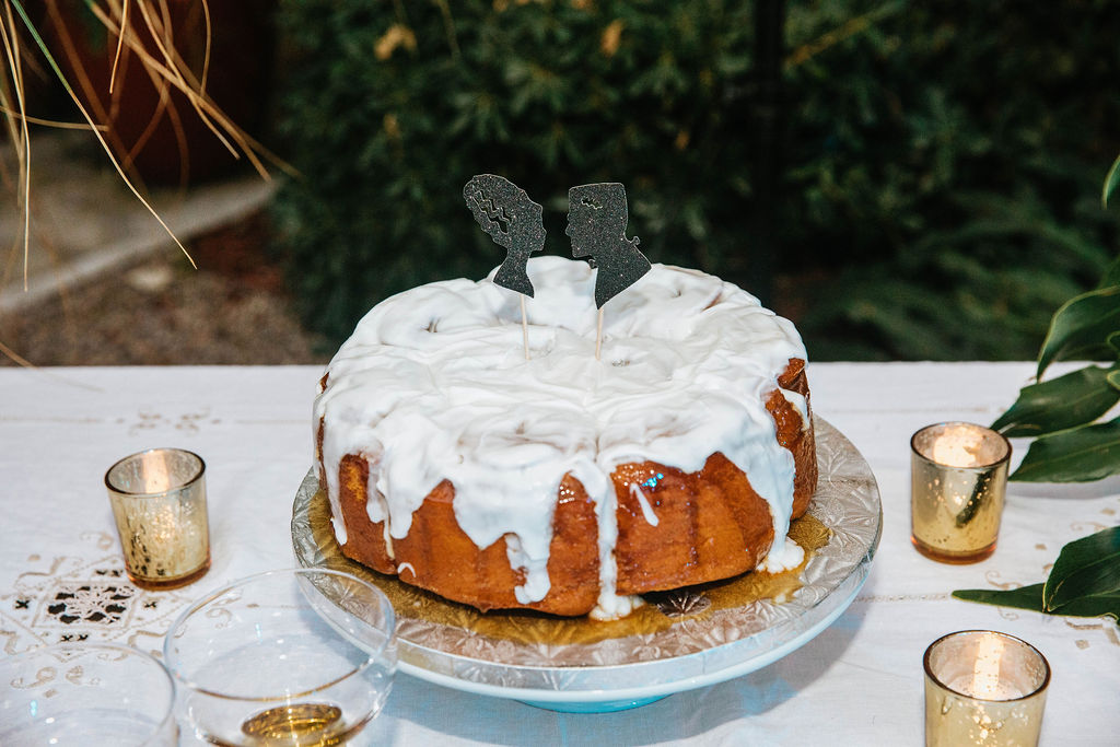 cinnamon roll wedding cake with frakenstein wedding cake topper