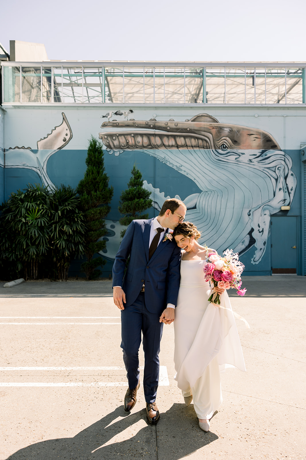 bride and groom stand outside of The Grassroom DTLA