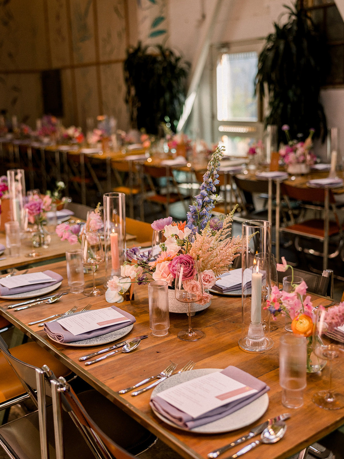 contemporary wedding reception at The Grass Room with pastel floral arrangements on tables