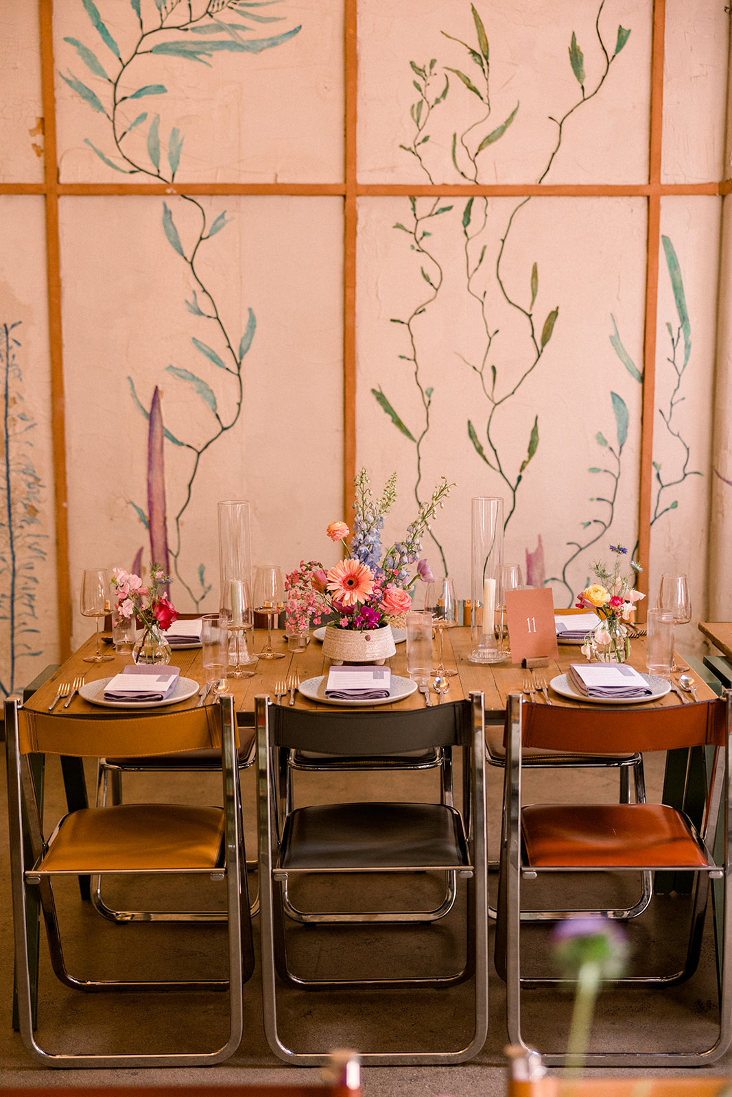 contemporary wedding reception at The Grass Room with pastel floral arrangements on tables