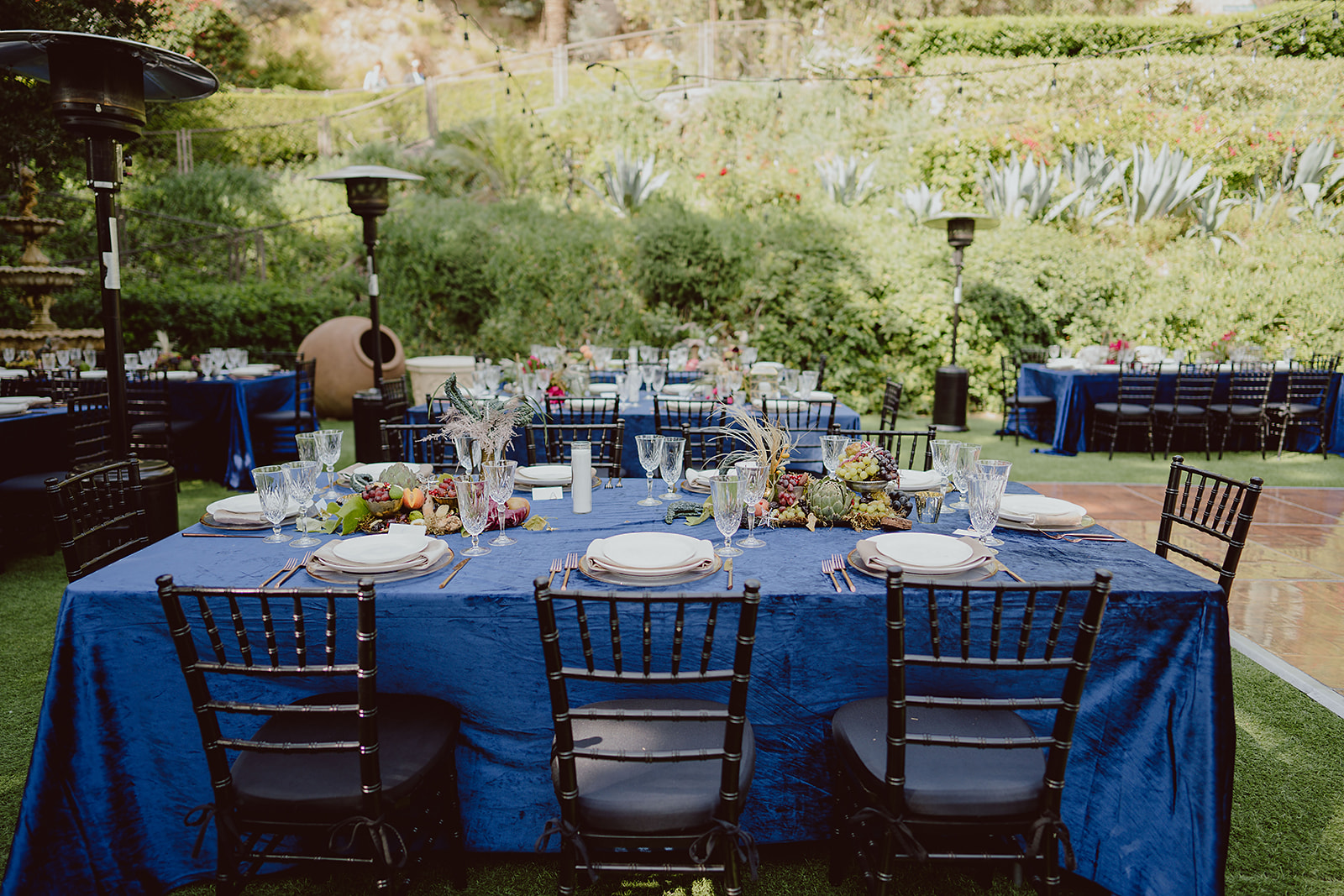 blue velvet table linens for colorful and magical wedding reception at The Houdini Estate