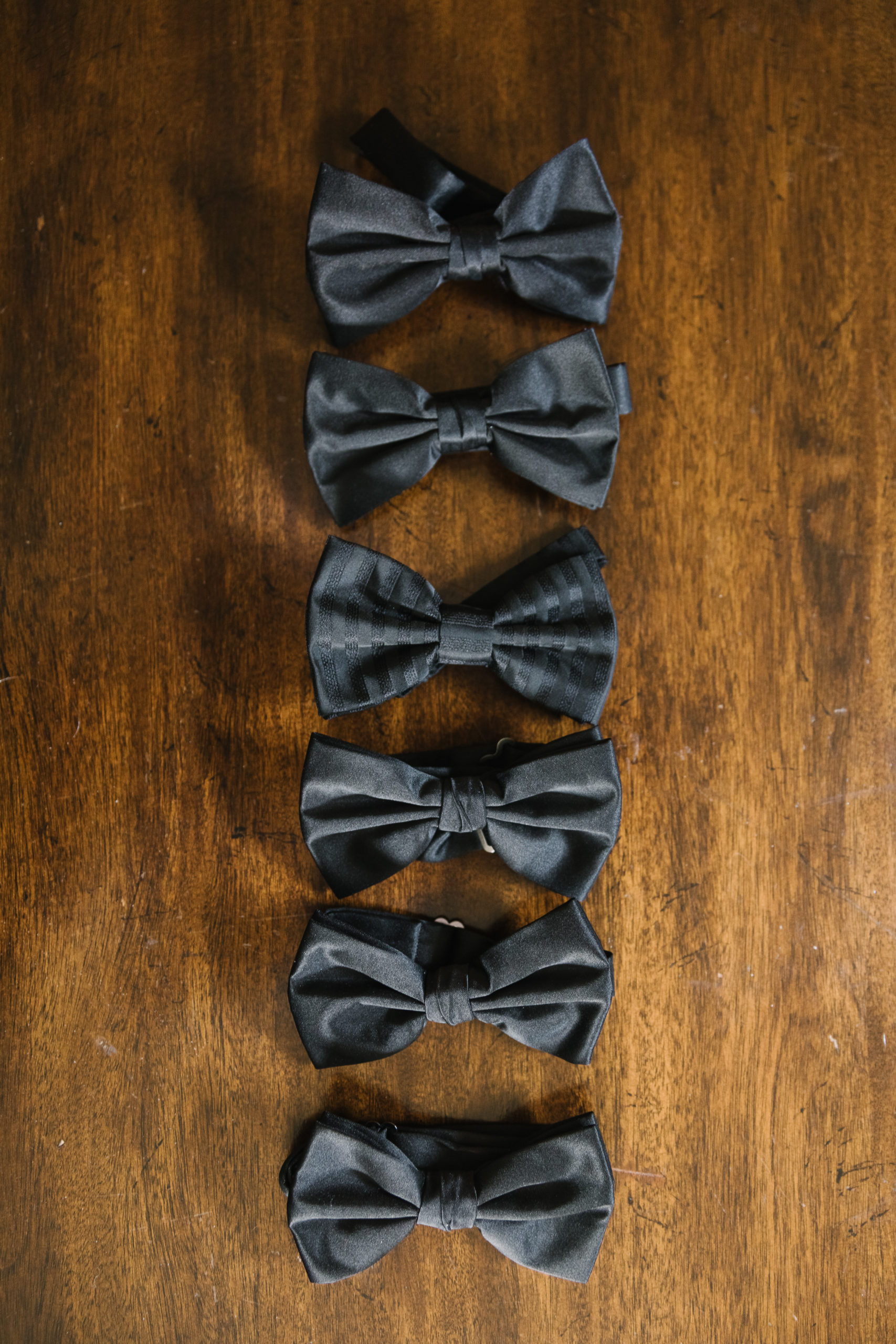 black bowties in a line