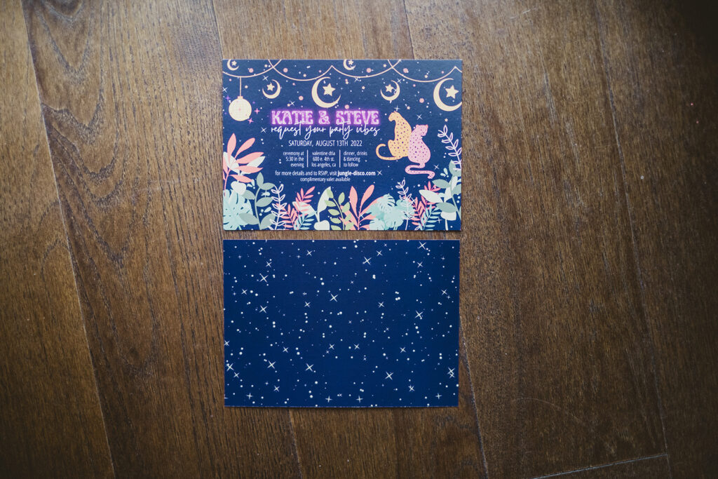 colorful celestial jungle themed wedding invitation suite with jaguars