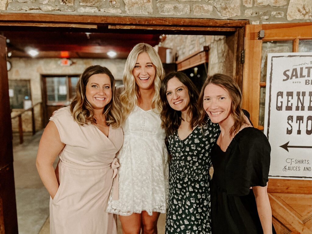 Kari of Feathered Arrow Events friends during her intimate rehearsal dinner in Texas