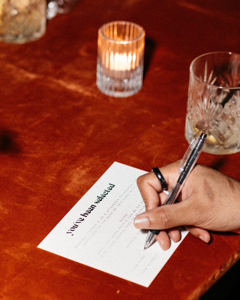 guest writing on RSVP card