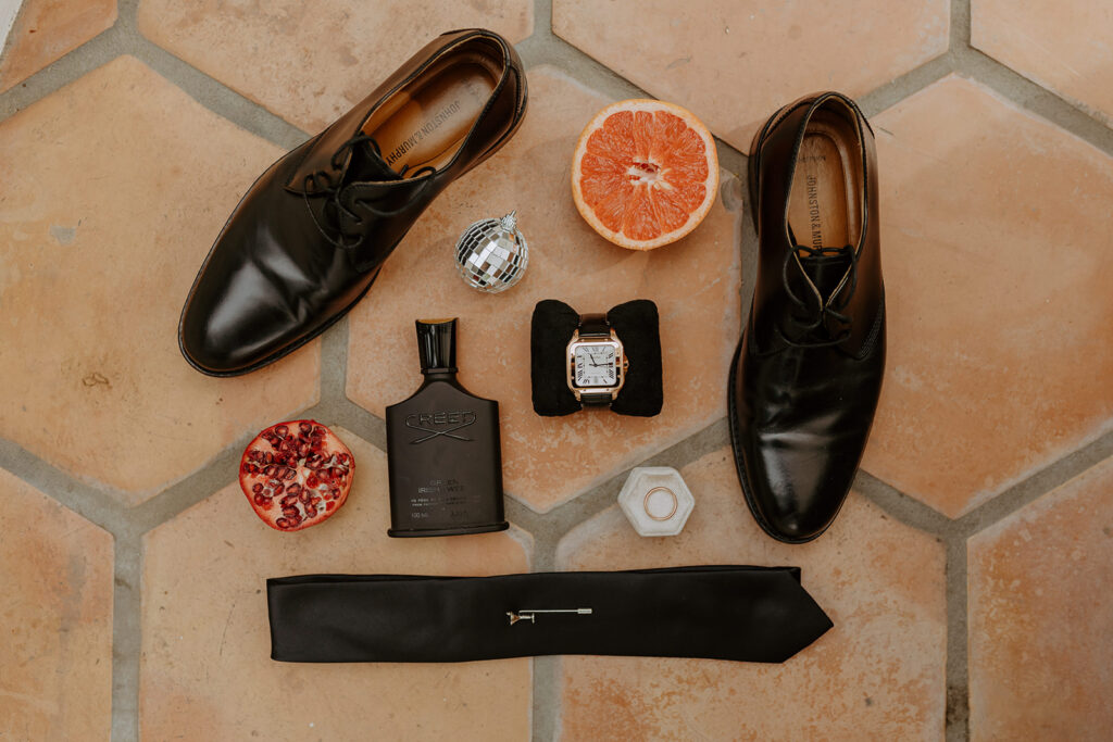 groom shoes, tie, and watch getting ready shot