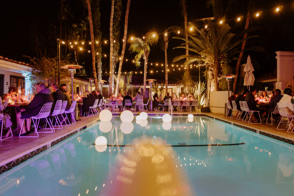 pool side wedding reception with glow balls at Villa Royale Palm Springs