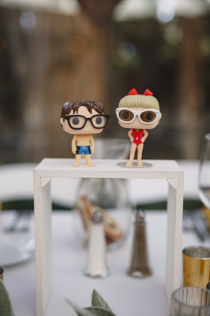 Pop Funko Sandlot figurines as sweetheart table markers for quirky wedding reception
