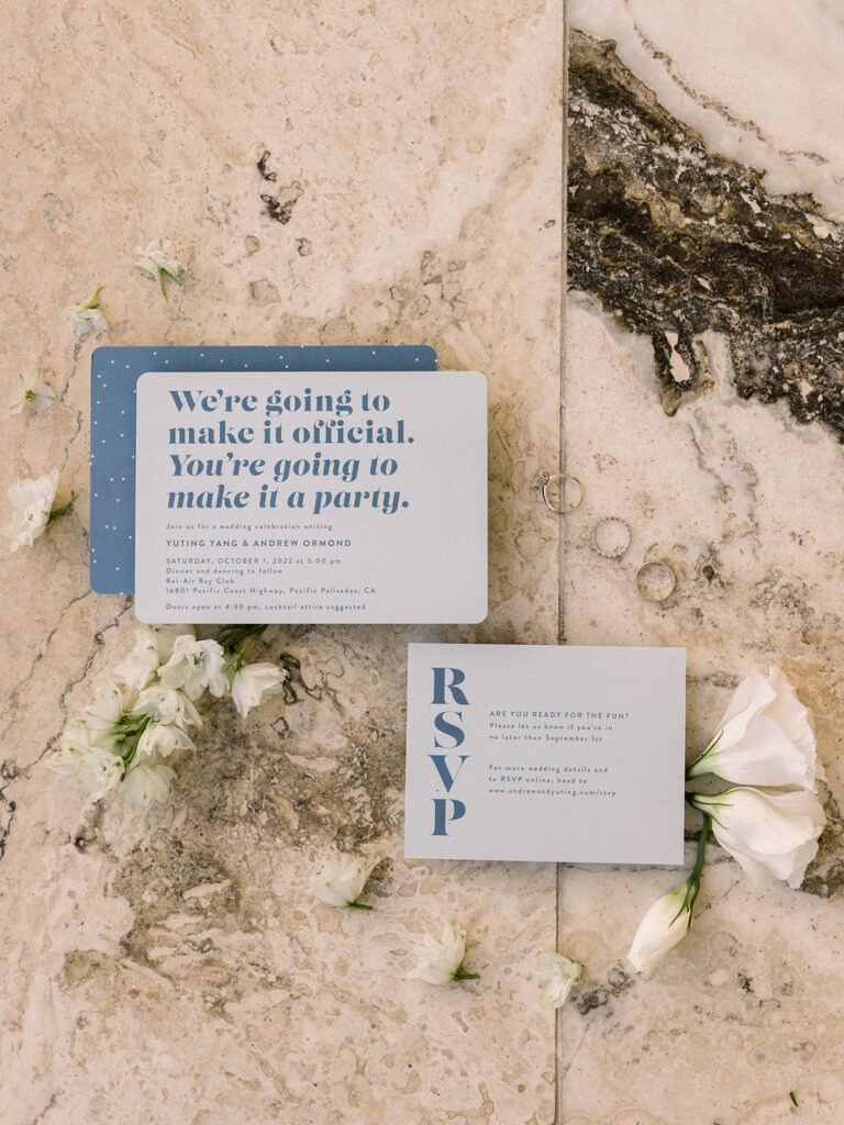 wedding invitation suite with timeless colors of blue, green and white