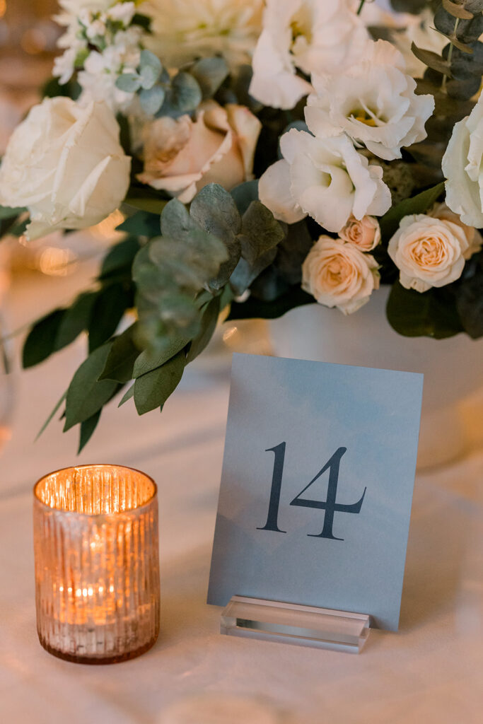 wedding reception at Bel-Air Bay Club with timeless wedding colors of white, blue and green with blue table number