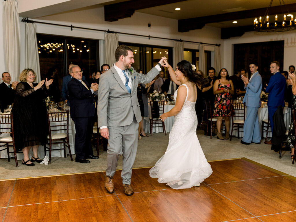 bride and groom first dance during reception at Bel Air Bay Club
