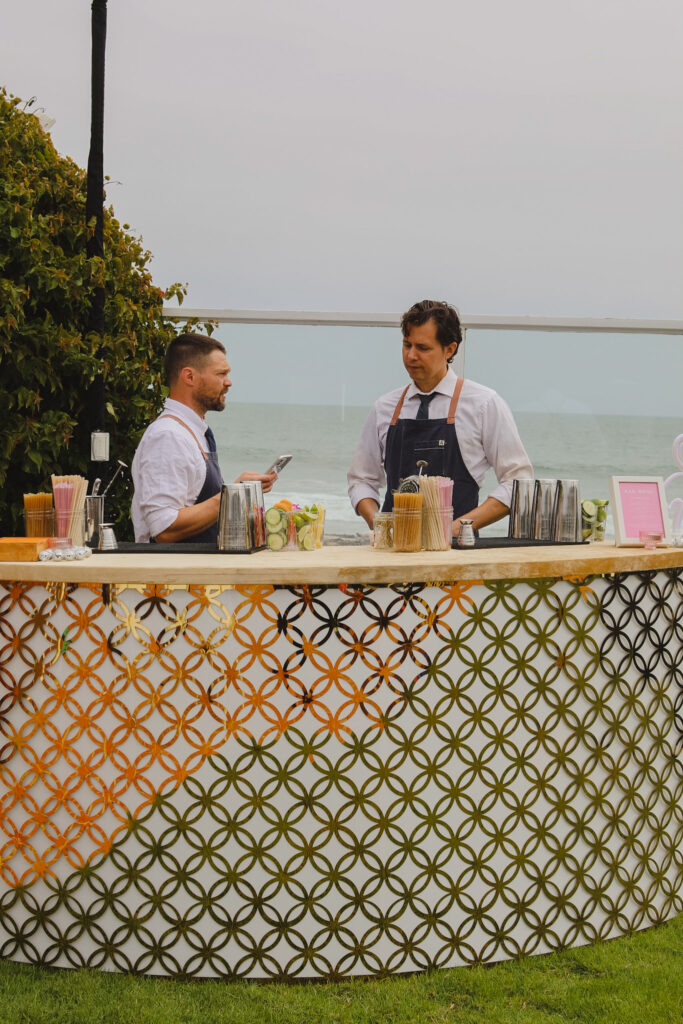 private beach house wedding reception with bar