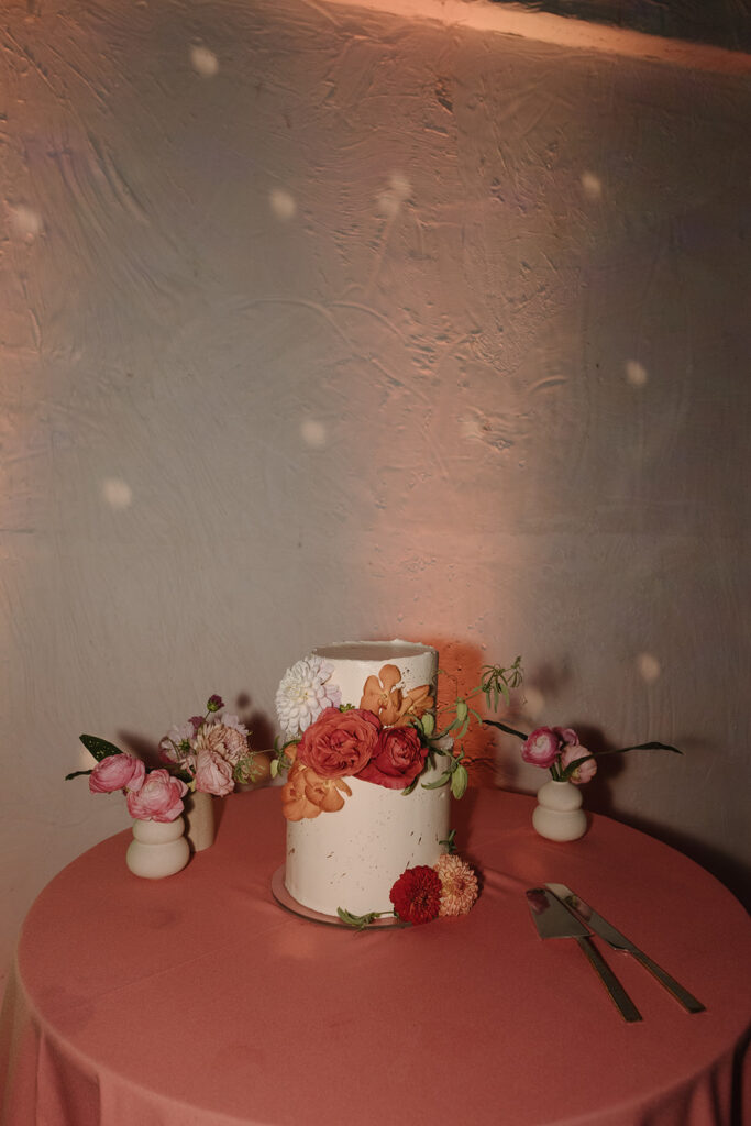 two tier wedding cake with pink florals