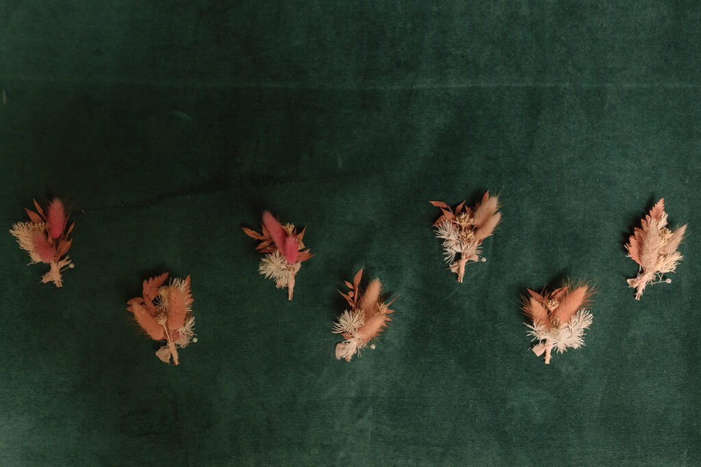 pink dried floral boutonnieres