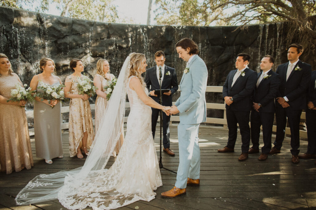 soft gold waterfall wedding ceremony at The Oak Room at Calamigos Ranch