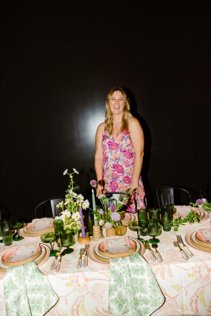 Kari of Feathered Arrow Studios putting final touches on a summer dinner