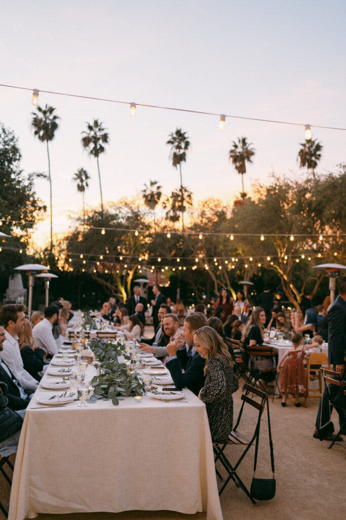 outdoor wedding reception during sunset