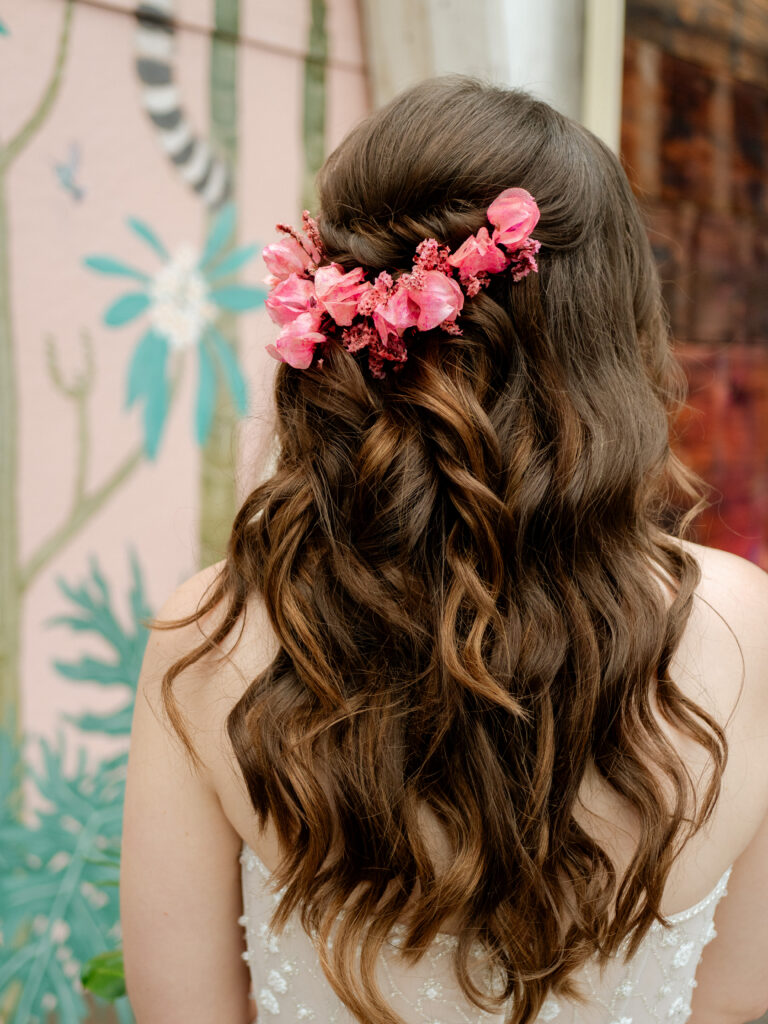 bridal hair with tropical floral hair piece